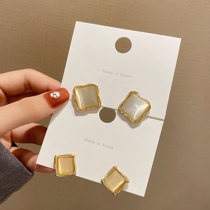 Dames Oorbellen – Ovaal & Opal – Bloem & Blad Design