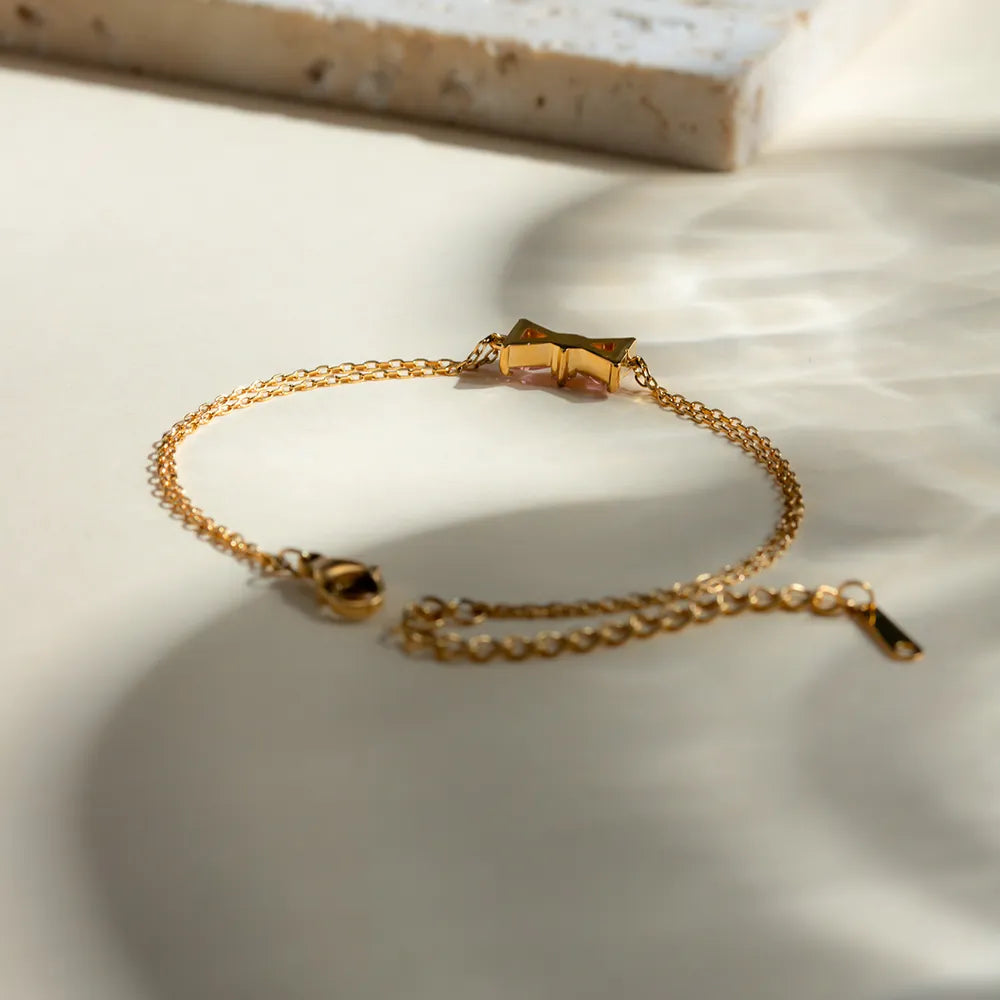 Roestvrijstalen Armband met Zirkoon Strik – Elegant & Tijdloos