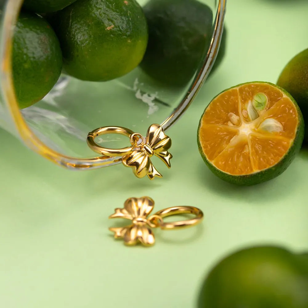 18K Vergulde Strik Oorbellen – Elegant & Speels