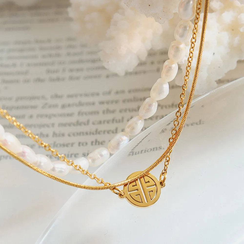 Titaniumstalen Drie-Laags Parelarmband – Elegant & Duurzaam